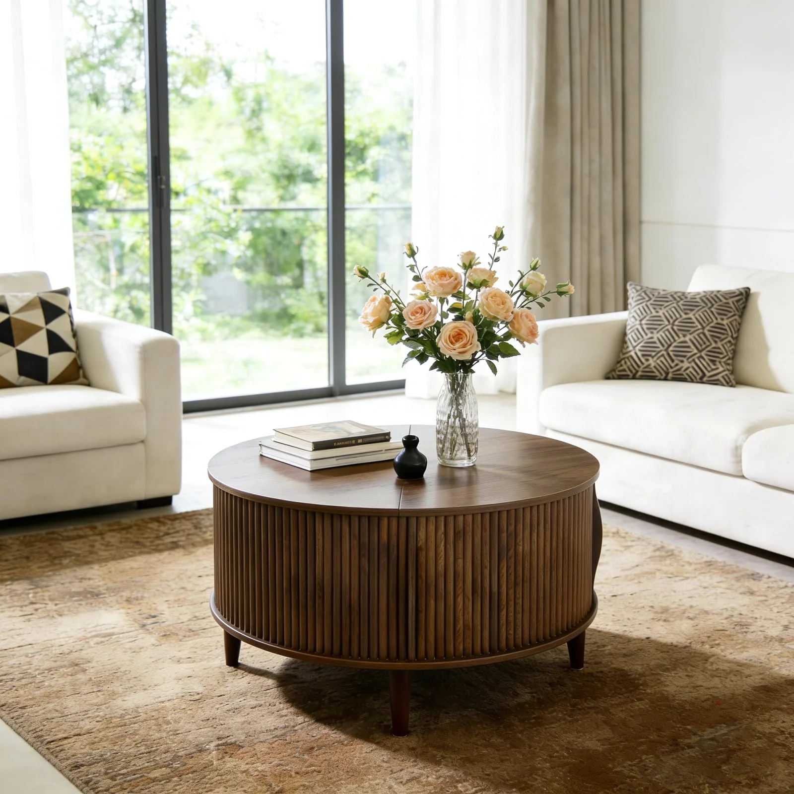 The round storage coffee table, lid closed, living room calm.